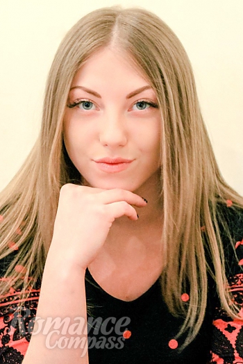 Ukrainian mail order bride Alina from Luhansk with light brown hair and blue eye color - image 1