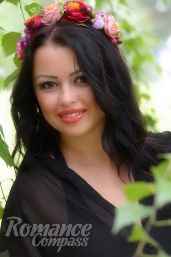 Ukrainian girl Anna,29 years old with brown eyes and black hair.