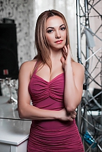 Ukrainian mail order bride Oksana from Dnipro with blonde hair and black eye color - image 9