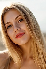 Ukrainian mail order bride Lina from Myrhorod with light brown hair and black eye color - image 2
