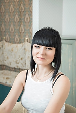 Ukrainian mail order bride Nanna from Kakhovka with black hair and grey eye color - image 3