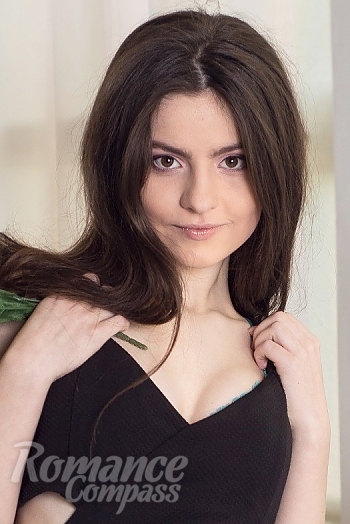 Ukrainian mail order bride Elena from Kiev with black hair and brown eye color - image 1