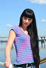 Ukrainian mail order bride Svetlana from Dnipro with black hair and green eye color - image 9