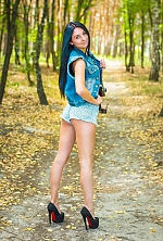 Ukrainian mail order bride Anastasia from Izum with black hair and green eye color - image 6