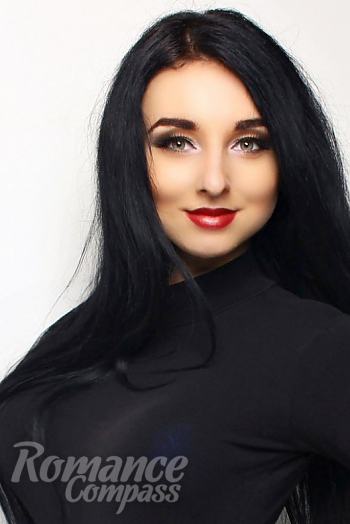 Ukrainian mail order bride Anastasia from Izum with black hair and green eye color - image 1