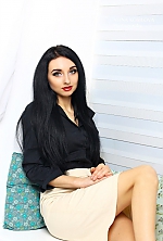 Ukrainian mail order bride Anastasia from Izum with black hair and green eye color - image 3