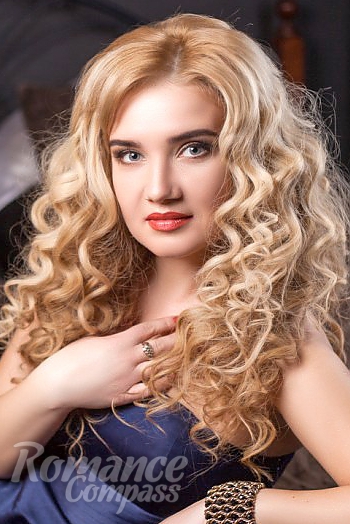 Ukrainian mail order bride Victoria from Kharkov with blonde hair and blue eye color - image 1