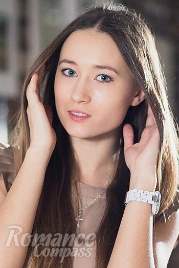 Ukrainian mail order bride Polina from Kazan with light brown hair and grey eye color - image 1