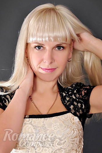 Ukrainian mail order bride Ludmila from Odessa with blonde hair and blue eye color - image 1