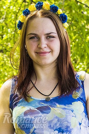 Ukrainian mail order bride Oksana from Nikolaev with light brown hair and green eye color - image 1