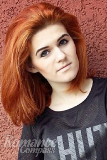 Ukrainian mail order bride Irina from Nikolaev with red hair and green eye color - image 1