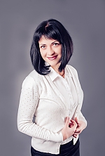 Ukrainian mail order bride Anna from Poltava with black hair and green eye color - image 3