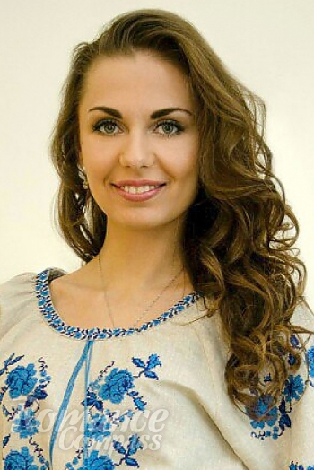 Ukrainian mail order bride Lyubov from Poltava with brunette hair and green eye color - image 1