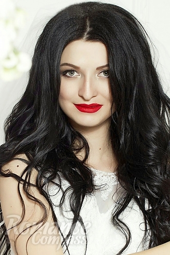 Ukrainian mail order bride Ekaterina from Kharkov with black hair and green eye color - image 1