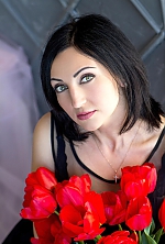 Ukrainian mail order bride Oksana from Nikolaiv with black hair and green eye color - image 9