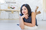Ukrainian mail order bride Oksana from Nikolaiv with black hair and green eye color - image 5