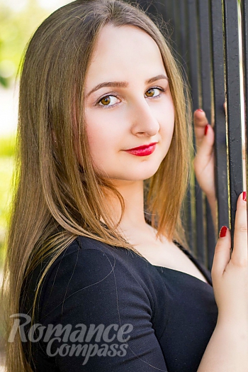 Ukrainian mail order bride Alena from Nikolaev with light brown hair and brown eye color - image 1
