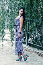 Ukrainian mail order bride Vera from Lviv with black hair and green eye color - image 4