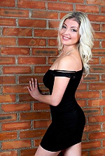 Ukrainian mail order bride Alla from Nikolaev with blonde hair and blue eye color - image 3