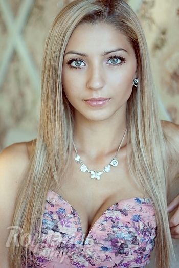 Ukrainian mail order bride Nadezhda from Nikolaev with blonde hair and green eye color - image 1