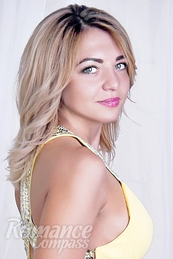 Ukrainian mail order bride Aleksandra from Kharkov with blonde hair and blue eye color - image 1