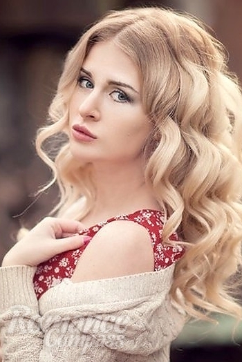 Ukrainian mail order bride Olga from Nikolaev with blonde hair and blue eye color - image 1