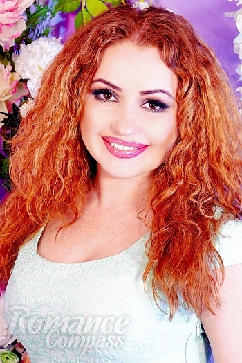 Ukrainian mail order bride Olga from Kharkov with red hair and brown eye color - image 1