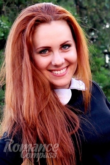 Ukrainian mail order bride Yuliya from Aleksandria with red hair and blue eye color - image 1