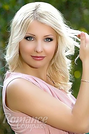 Ukrainian mail order bride Yuliya from Odessa with blonde hair and blue eye color - image 1