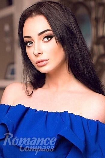 Ukrainian mail order bride Natalia from Kiev with black hair and green eye color - image 1
