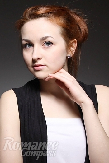 Ukrainian mail order bride Marina from Kiev with red hair and green eye color - image 1