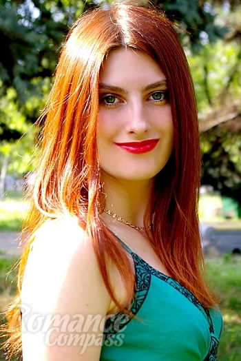 Ukrainian mail order bride Anna from Zaporojye with red hair and green eye color - image 1