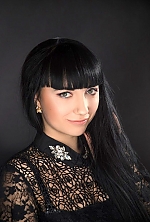 Ukrainian mail order bride Katya from Pavlograd with black hair and green eye color - image 6