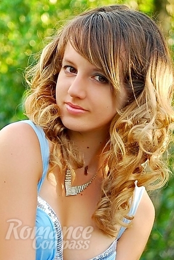 Ukrainian mail order bride Daria from Nikolaev with light brown hair and brown eye color - image 1