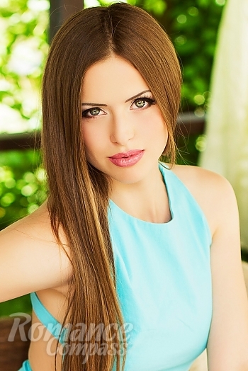 Ukrainian mail order bride Angelika from Kiev with light brown hair and blue eye color - image 1