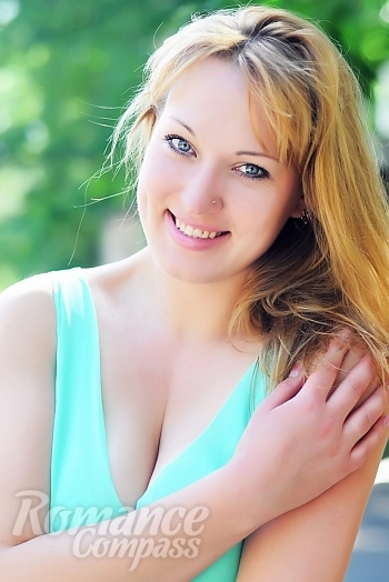 Ukrainian mail order bride Ksenia from Nikolaev with blonde hair and blue eye color - image 1