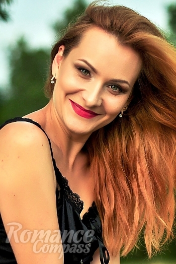 Ukrainian mail order bride Alla from Nikolaev with red hair and green eye color - image 1