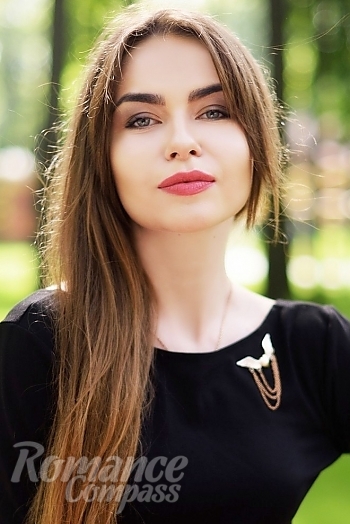 Ukrainian mail order bride Christina from Odessa with light brown hair and blue eye color - image 1