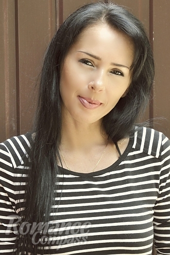 Ukrainian mail order bride Kristina from Sumy with black hair and green eye color - image 1