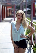 Ukrainian mail order bride Anna from Nikolaev with blonde hair and blue eye color - image 3
