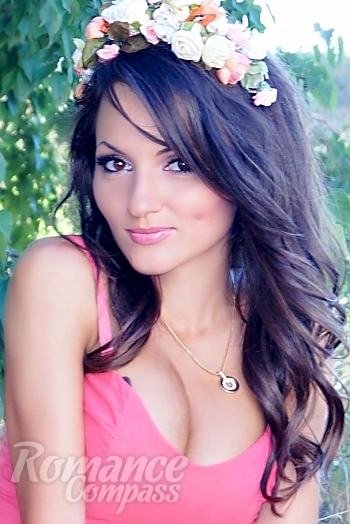 Ukrainian mail order bride Yulia from Nikolaev with black hair and hazel eye color - image 1