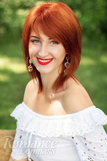 Ukrainian mail order bride Yana from Kharkiv with red hair and grey eye color - image 1