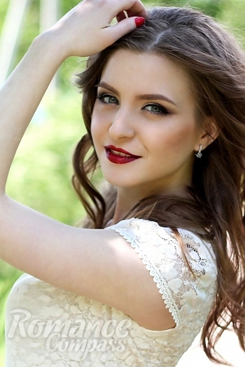Ukrainian mail order bride Valentina from Lygansk with light brown hair and green eye color - image 1