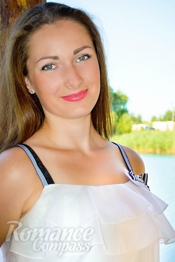Ukrainian mail order bride Anna from Poltava with light brown hair and grey eye color - image 1