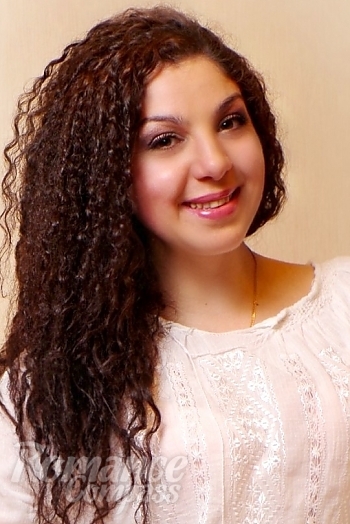 Ukrainian mail order bride Olga from Odessa with brunette hair and hazel eye color - image 1