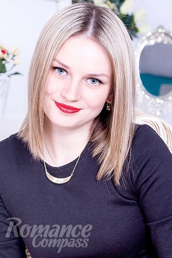 Ukrainian mail order bride Polina from Simferopolj with blonde hair and grey eye color - image 1