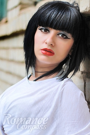 Ukrainian mail order bride Oksana from Dnipro with black hair and black eye color - image 1