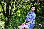 Ukrainian mail order bride Anna from Starobelsk with black hair and blue eye color - image 3