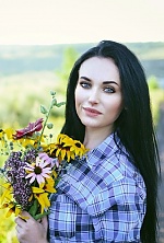 Ukrainian mail order bride Anna from Starobelsk with black hair and blue eye color - image 2