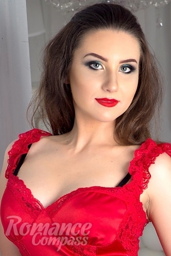Ukrainian mail order bride Karina from Odessa with light brown hair and blue eye color - image 1